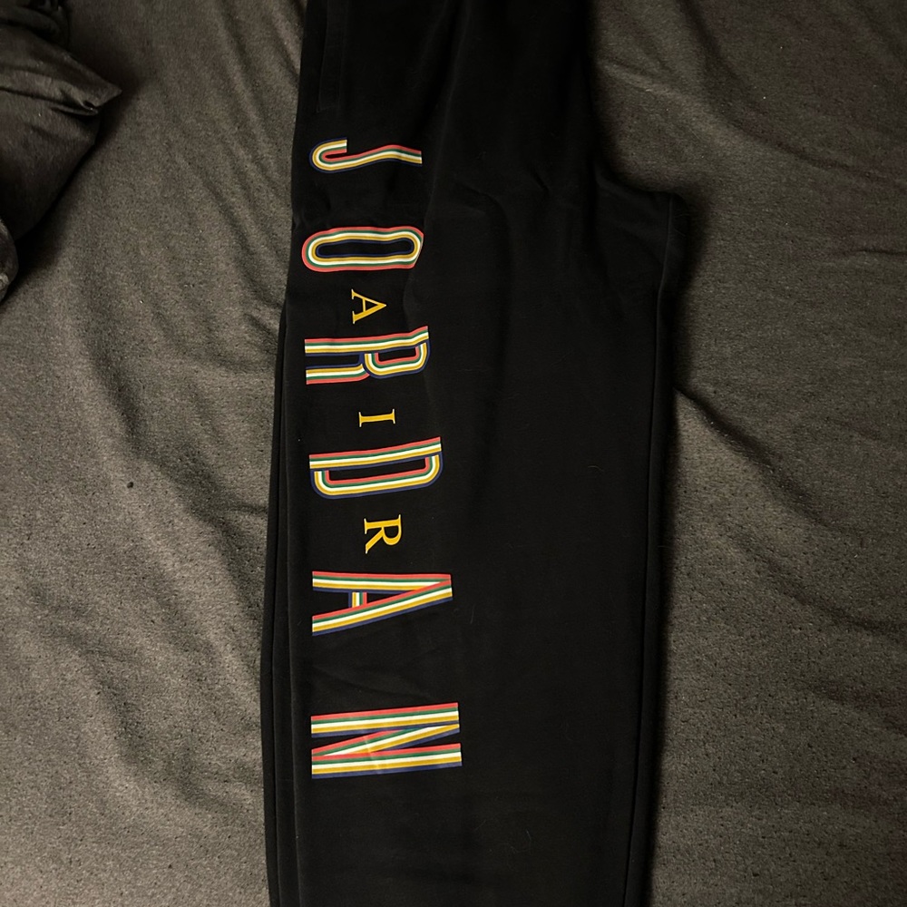 NWT Men’s Jordan XL sweatpants. Color black with multicolor Jordan writing